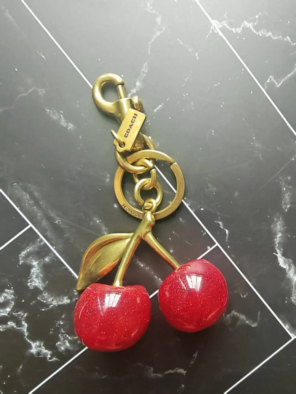 Coach Gold-Tone Cherry Key Charm with Red Glitter